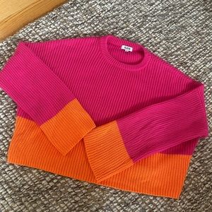 A beautiful bright and cheery sweater! Cropped with bell sleeves.